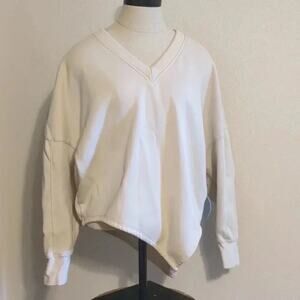Fabletics asymmetrical cream sweater size S